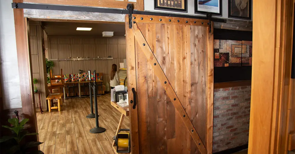 Temporary easy to install indoor barn door in hallway
