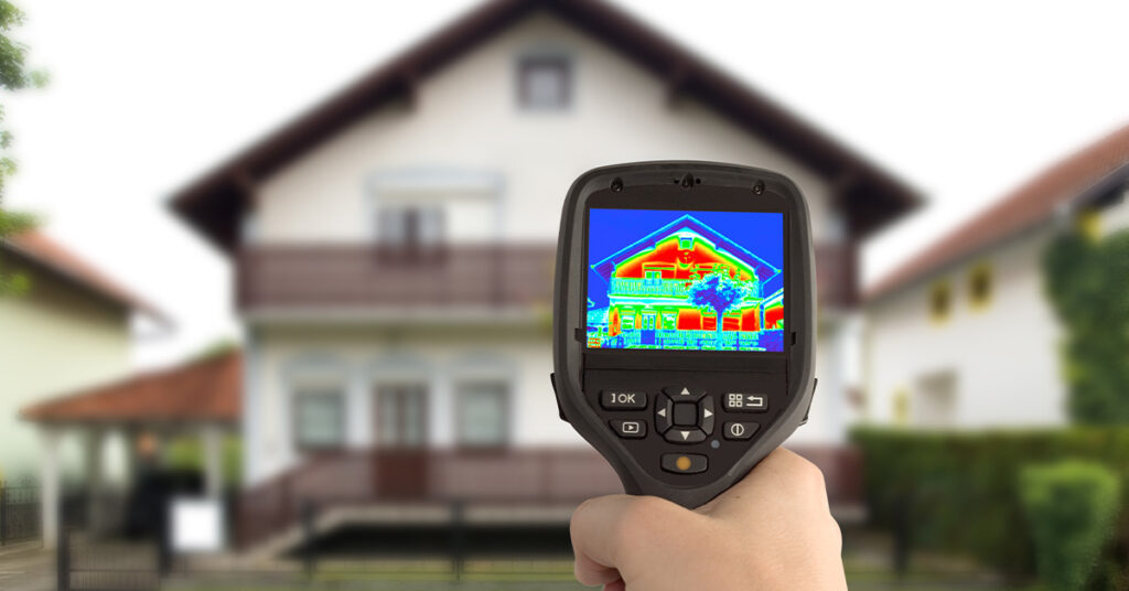 Thermal image of heated house in summer heat