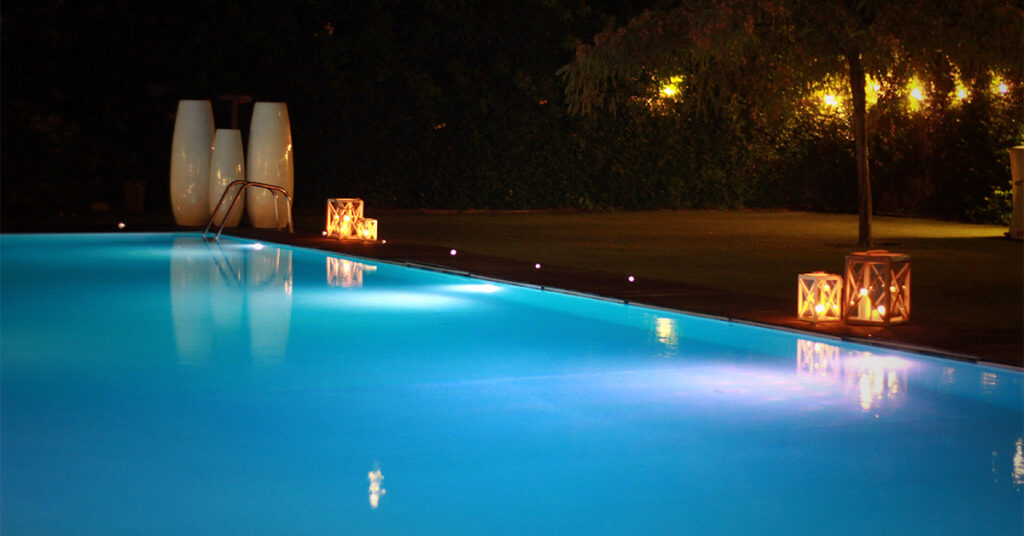 Vinyl liner pool with lights when it's dark outside