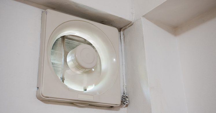 Bathroom fan extractor mounted on wall