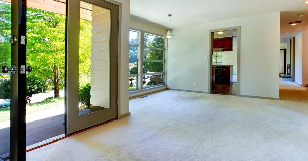 Empty house with carpet installed all over the floor